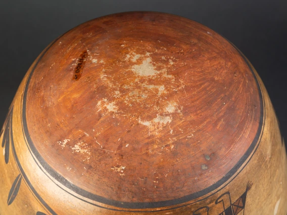 A view of the bottom of a large Hopi ceramic jar.