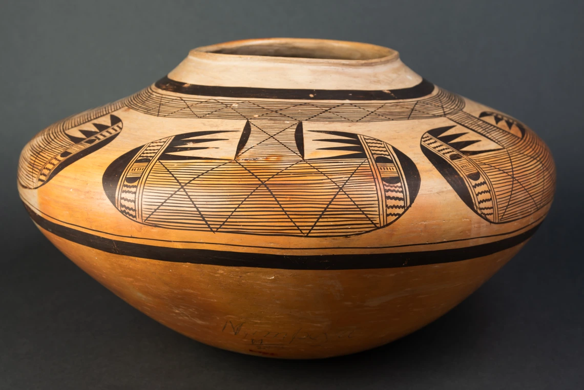 large polychrome olla with bird-wing design