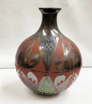 Polychrome thin-necked Mata Ortiz jar