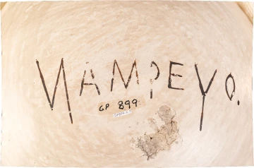 An artist's signature on a piece of pottery reads, "Nampeyo."